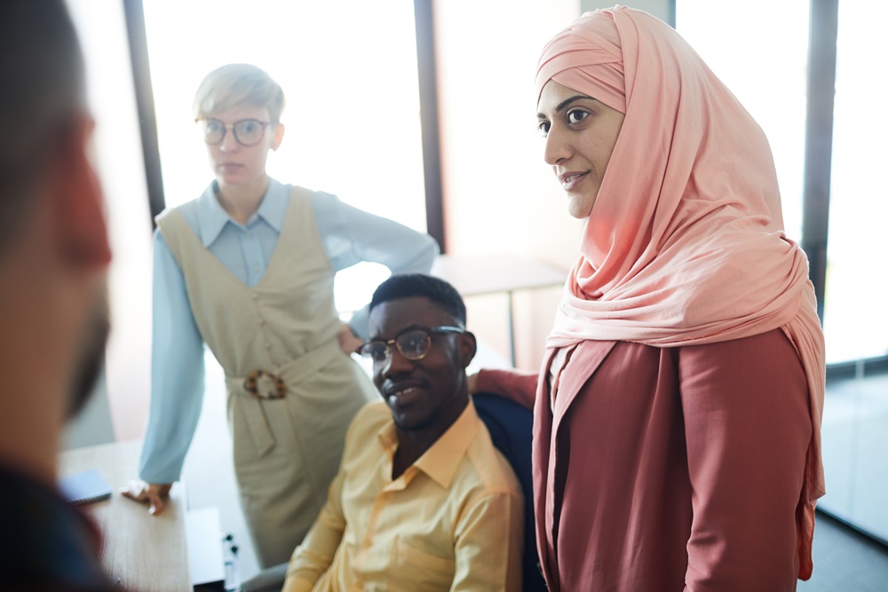 Multi-Ethnic Team in Conference Room multiracial work group