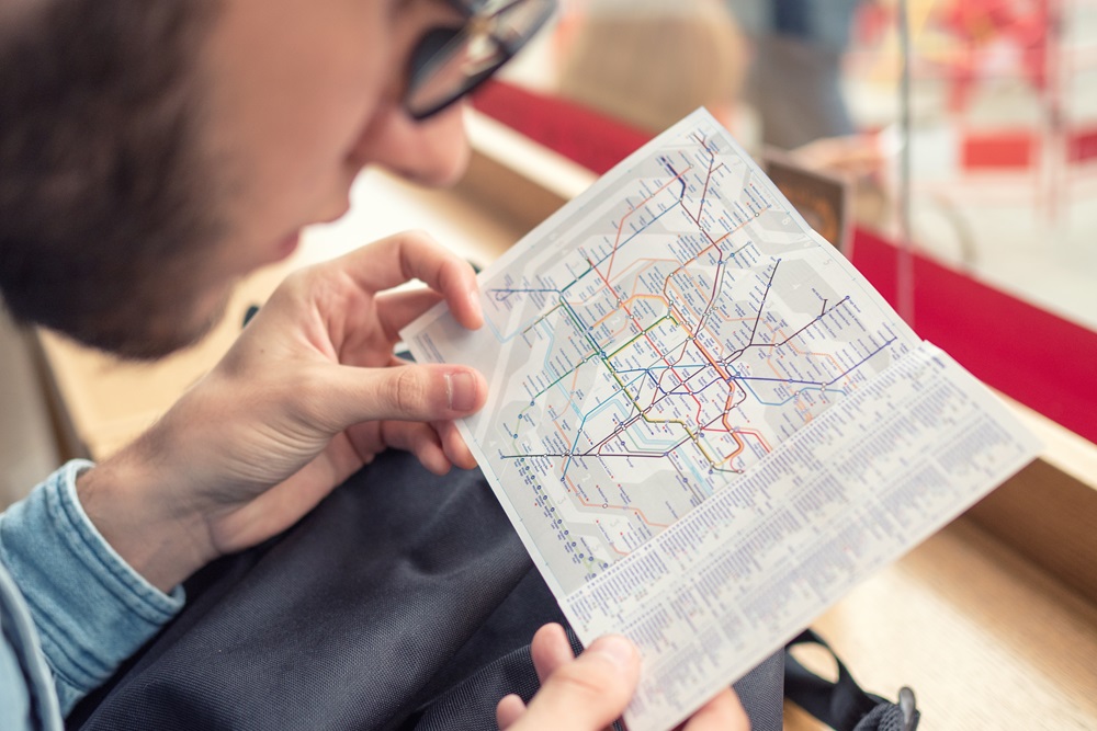 London underground map Man looking at London underground map