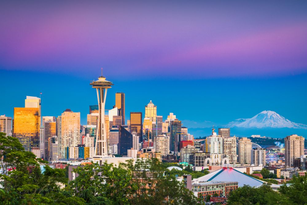 seattle Seattle skyline with Mount Ranier in the background business travel destinations seattle