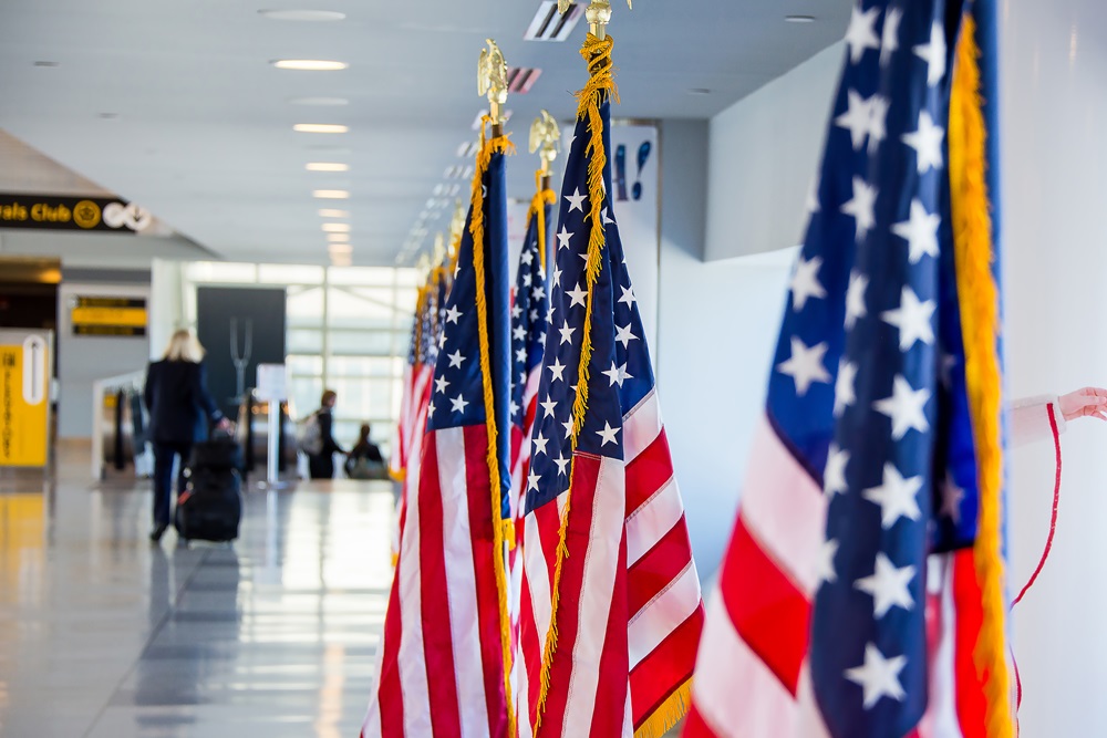 Row of American flags in the airport USA global entry at customs